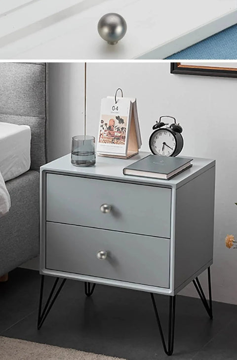 Close-up view of matte gray cabinet knob on drawer, featuring 5 Pack Matte Gray Cabinet Knobs 0.94 Inch Diameter Zinc Alloy Round Ball Drawer Pulls With Screws