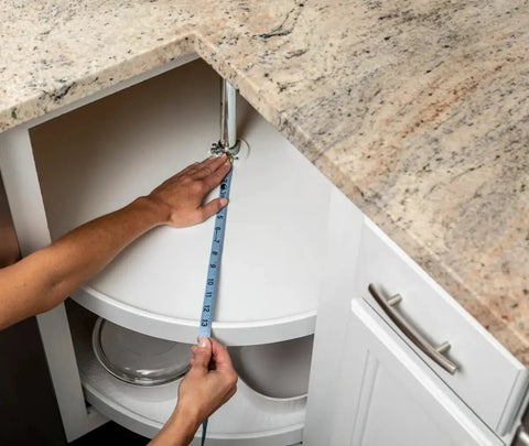 Installing 30-inch Premium Circular Lazy Susan Shelf Liner Kit for Kitchen Cabinets, showing non-slip white surface and fit around dishes