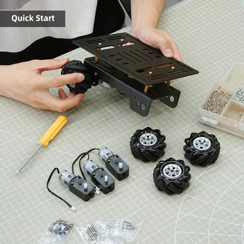 Person assembling Mecanum Wheel Robot Chassis Kit With 360 Degree Omnidirectional Wheels Aluminum Alloy Frame TT Motors 66mm