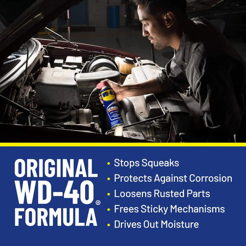 Mechanic using EZ Reach Flexible Straw Multi Use Lubricant For Tight Spaces By WD-40 14.4 Oz Spray Can With 8 Inch Straw on car engine