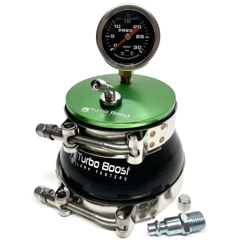 Turbo Boost Leak Tester kit with green aluminum lid, black base, boost pressure gauge, and metal clamps.