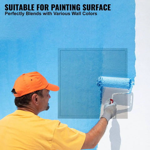 Person painting blue wall with a roller near a metal access panel