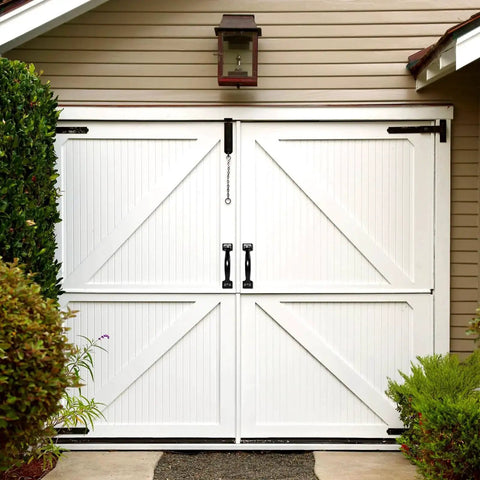 White double garage doors with Two Pack 5.5 Inch Metal Door Handles Heavy Duty Modern Hardware, matte black finish, exterior use.