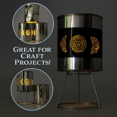 Craft project using empty quart paint cans with lids, unlined metal, showing decorative light holes, crafted with metal stand.