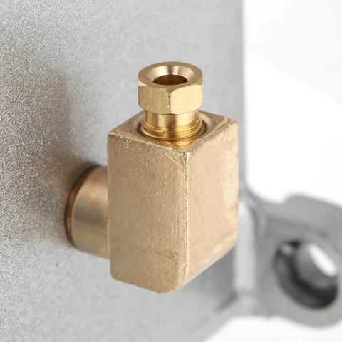 Close-up of a brass outlet on a Heavy Duty Manual Lubrication Pump With Double Outlet Port 500CC CNC 4mm Oiler for punching machine