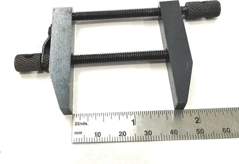 Pro Grade 2 Inch Parallel Clamps for Woodworking and Cabinetry with smooth parallel jaws shown with ruler for size reference.