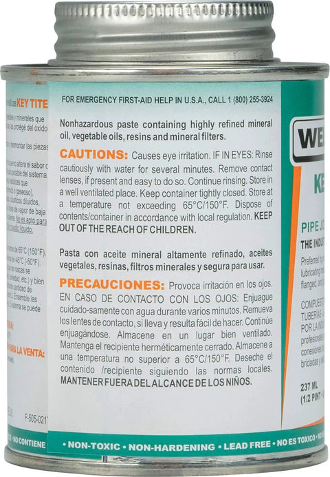 Side view of Heavy Duty Metal Pipe Thread Sealant For Leak Free Joints And Smooth Lubrication That Seals And Prevents Rust On Threaded Flanged And Gasketed Metal Pipes Low VOC Green Formula 1/2 Pint 8 Fl Oz By Weld On 10068 505 Key Tite showing caution label.