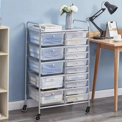Storage cart with multiple drawers on rubber caster wheels next to a desk and lamp