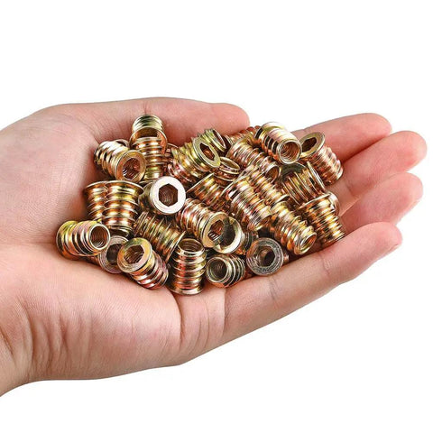 Hand holding DIY Ready Wood Threaded Inserts Kit, 80 Pcs 1/4-20 Metal Studs With Hex Drive, Bolt Fastener Connectors For Wood