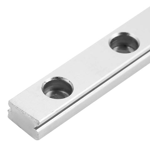 Close-up of Mgn9H 100mm Miniature Linear Slide Block 9mm Width Pro Grade, showing smooth metallic finish and mounting holes.