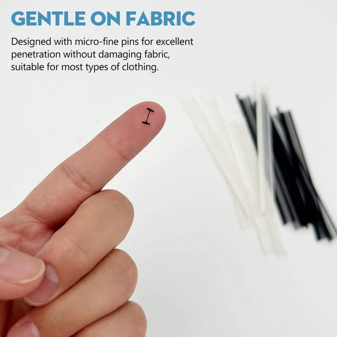 Close-up of 2000 PCS Micro Stitch Gun Fasteners Kit 0.18 Inch Extra Fine Tagging Fasteners in white and black, with a finger showing size.
