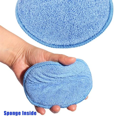 Hand holding blue Microfiber Wax Applicator Pads for Car Detailing 5 Inch Foam Buffing Pads with Built In Sponge, 6 Pack.