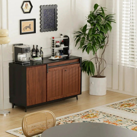 Stylish kitchen sideboard set in a modern room with a potted plant and wall art