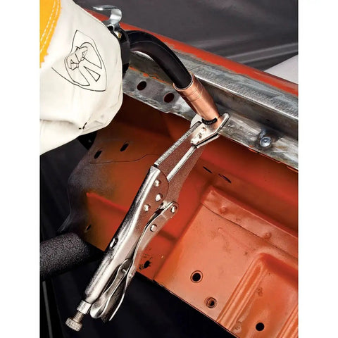 MIG Welding Torch Spot Weld Adapter Kit with forked jaw pliers in use for duplicating full penetration OE welds from one side.