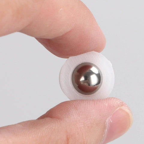 Close-up of 20 Pack Mini Ball Transfer Bearings 1/3 Inch White Nylon Units with Stainless Steel Ball held in hand