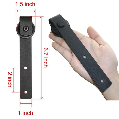 Hand holding J shape hanger from 4FT Super Mini Sliding Barn Door Hardware Kit for Single Door TV Stands Wardrobes and Cabinets