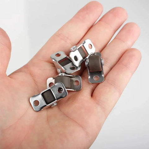 Mini Fixed Caster Wheels 0.5 Inch Low Profile Rubber Set Of 8 shown on a hand for scale, highlighting small size and steel plates.