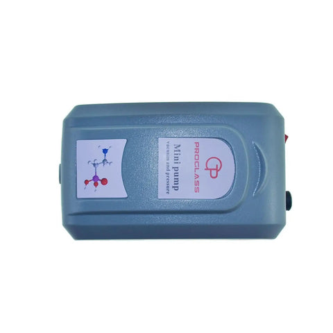 Mini Lab Vacuum And Pressure Dual Function Pump For Filtration And Distillation Applications, compact grey unit, top view.