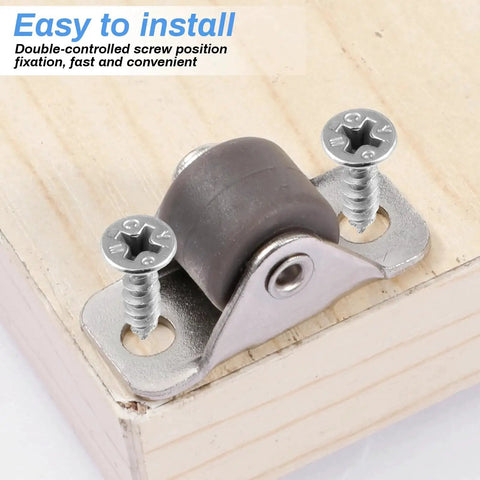 Close-up of Sixteen Half Inch Mini Low Profile Casters With One Way Micro Wheels Self Adhesive Rubber Rollers installed on wood