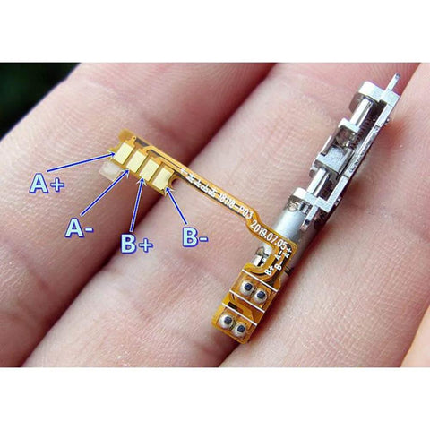 Mini Micro 4mm 5V 2-Phase 4-Wire Precision Planetary Gearbox Gear Stepper Motor Screw Metal Slider Nut on a hand