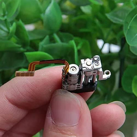 Close-up of 2-Pack Mini 5mm 2-Phase 4-Wire 3V 5V Planetary Gear Stepper Motor Linear Screw Slider held between fingers.