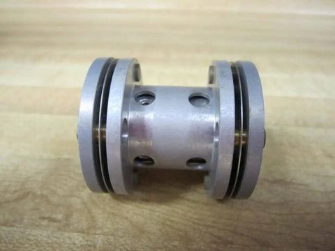 Side view of Miniature Flexible Disc Coupling CC37 One And A Half Inch By One And Seven Sixteenth Inch Diameter For Small Shaft Motors And Gearboxes Precision High Torque Low Backlash Durable Compact Rexnord 017225 made of metal with visible disc holes, engineered for torque transmission in limited spaces.