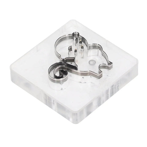 Monkey Pattern Alloy Steel Leather Cutting Die And Punching Mold for DIY crafts in clear packaging, front view.