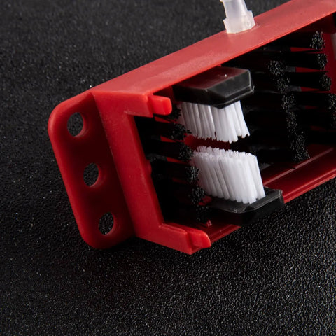 Close-up of red brush from All Models Motorcycle Chain Cleaning Kit With Lube Device And Brush Gear Cleaner Tool For Chains, Easy Wash Accessory.