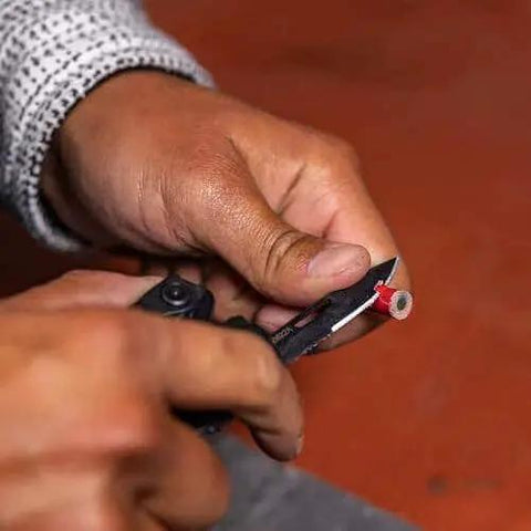 Using the Suspension-NXT 15-In-1 EDC Multi Tool With Pocket Knife for wire stripping
