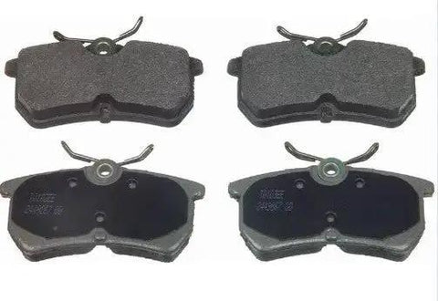 1991 Honda Accord Front QC496 Ceramic Disc Brake Pad Set, overhead view showing four ceramic pads with shims.
