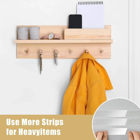 Wall shelf with coat hooks holding keys and a jacket, highlighting Double Sided Heavy Duty Adhesive Tape For Hanging Decorations And Lights Indoors Or Outdoors Ultra Strong Nano Tape With Reusable No Nails Needed Damage Free Hold 1.2 Inch By 120 Inch Pack Of 1 Great For Garlands And More for secure mounting.