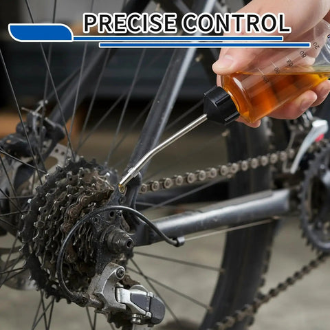 Applying oil to bicycle chain with Three Pack Needle Oiler With Extra Long 3.5 Inch Stainless Needle Tip And 4 Oz LDPE Oil Applicator For Gun Oil Crafts Hinges Sewing Machines And More Super Easy To Use For Precise Application In Tight Spots.