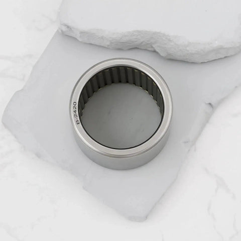 Needle Roller Bearing B-2420 Set Of 2 With Bore 38.1mm Outer Diameter 47.625mm bearing on stone surface