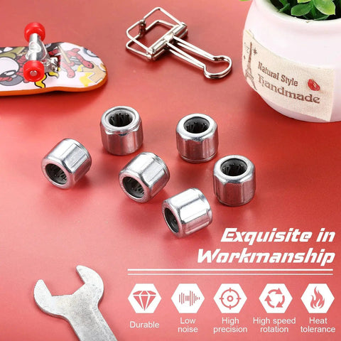 Six Pieces Heavy Duty Needle Roller Bearings 8mm Bore 14mm OD 12mm Width on red surface with wrench and small decorations