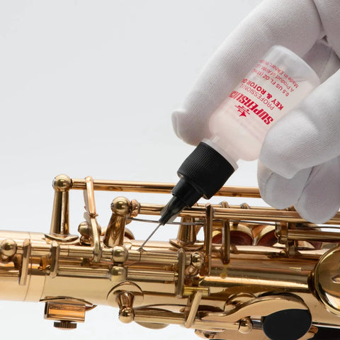 Key and Rotor Oil with Precision Needle Tip Applicator for Brass and Woodwind Instruments, 0.5 Oz, applied to saxophone keys