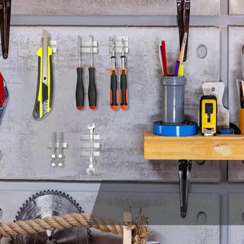 Six Pack Neodymium Bar Magnets With Adhesive Backing 60x10x3mm 18 Lb Pull for tools on a wall in a workshop setting
