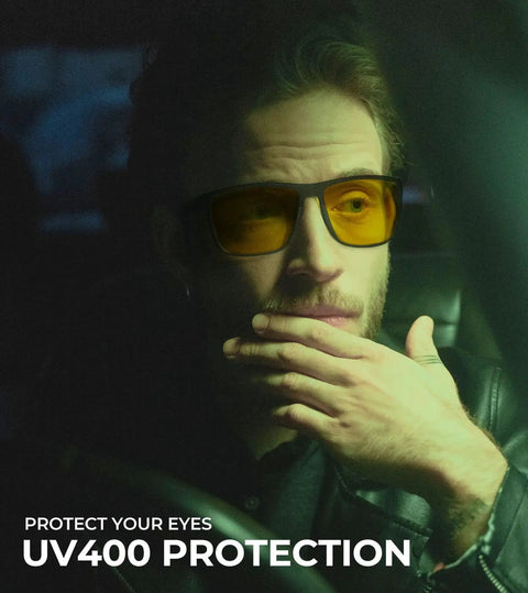 Man wearing Night Vision Driving Glasses For Men Lightweight Anti Glare Eyewear with UV400 protection in a car.