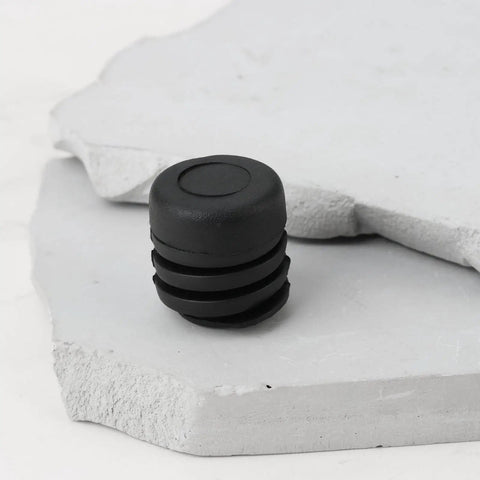 Close-up of a single black rubber stopper from 4Pcs Hood Rubber Bumper Stopper Set Fits Nissan Pulsar NX 1983-1990 And 200SX 1984-1988