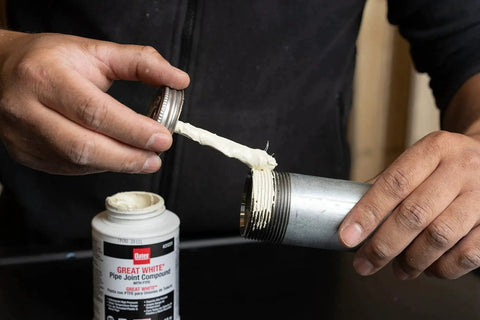 Applying Non Toxic Non Hardening White Pipe Joint Compound For Threaded Joints on metal pipe, 4 oz jar Oatey
