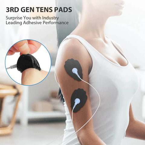 Person using Unit Electrode Pads NURSAL 20 Pack 3.5mm Snap EMS Replacement Pads for Electrotherapy on arm, close-up view.