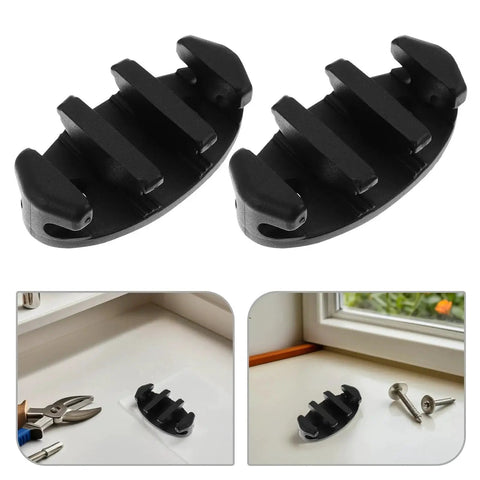 Front view of two black nylon marine rope cleats with screws for deck mounting