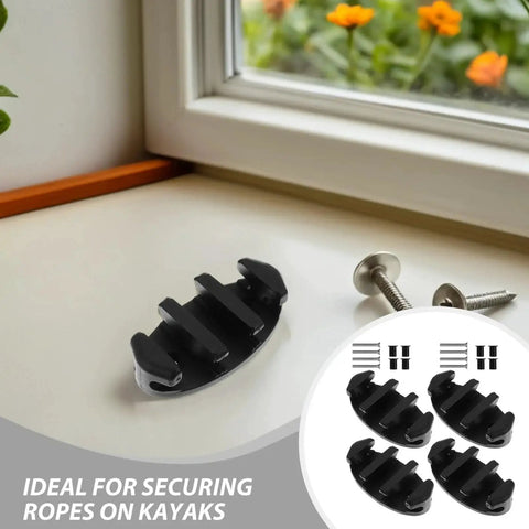 Four black nylon boat cleats with screws for kayak deck mounting, front view