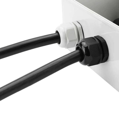 Close-up of 10 Pack Nylon Cable Glands Waterproof M20 X 1.5, 6-12 Mm Range Black Gland Connector installed on a white box with cables.