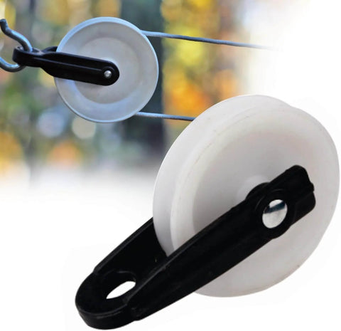 Close-up of Nylon Clothesline Pulley 2 inch Diameter Nylon Pulley showing black metal with white wheel for clothesline use outdoors.