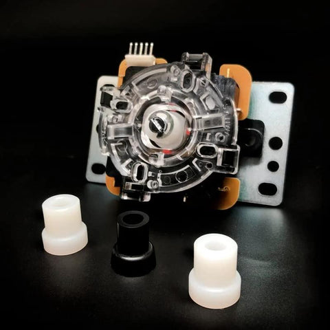 Nylon oversize actuator (1mm) for Sanwa JLF and Hori Hayabusa joysticks; clear round disc with white and black spacers
