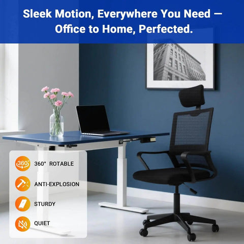 Home office setup with a black mesh office chair and adjustable desk, featuring 360-degree rotation and anti-explosion features, in front of a blue wall.
