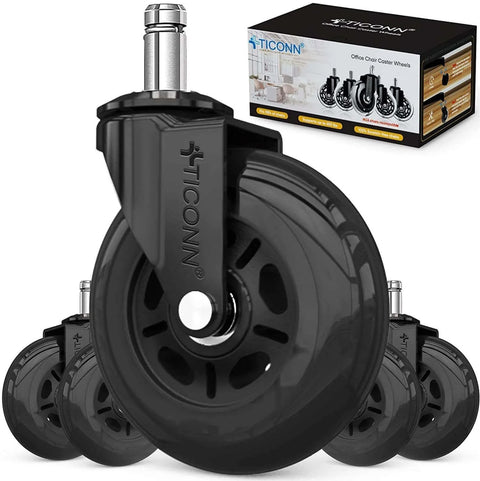 Set of black caster wheels for office chair with packaging in the background