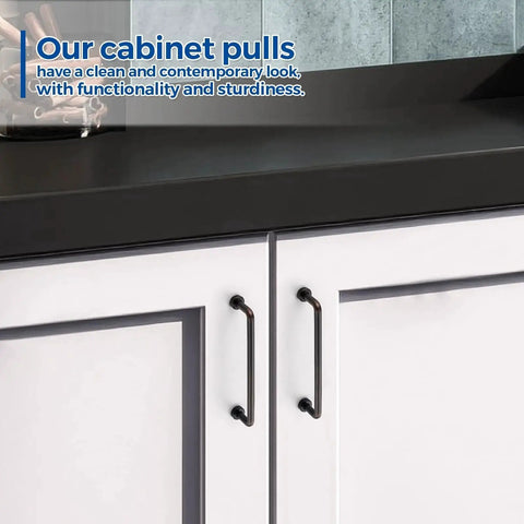 Oil Rubbed Bronze Cabinet Pulls 5 Inch Hole Center Zinc Alloy Vintage Style Handles installed on white kitchen cabinet doors