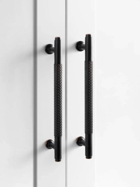 Five Pack Oil Rubbed Bronze Knurled Cabinet Handles With 3.78 Inch Center To Center 96mm Hole Spacing solid zinc pictured on cabinet doors