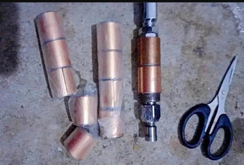 Oilless Bushing Sleeve Bearing 1.25 Inch Bore 1.40 Inch OD 1.17 Inch Length with bronze interlayer and equipment parts visible.